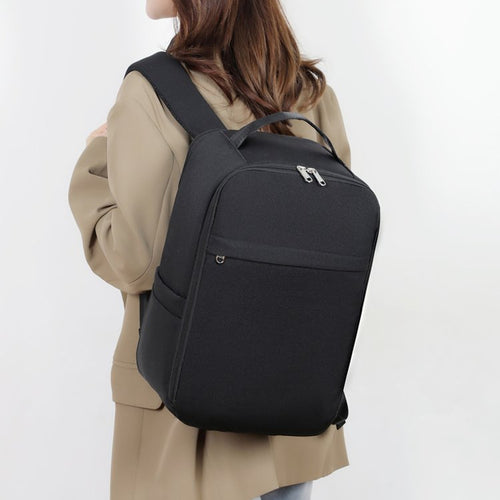 The elegant, mature design in a clean solid color pattern makes this backpack effortless to pair with both professional and casual outfits.