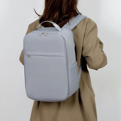 The elegant, mature design in a clean solid color pattern makes this backpack effortless to pair with both professional and casual outfits.